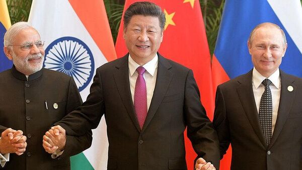 Орос, Хятад, Энэтхэг улсууд нь дэлхийн голлох асуудлууд дээр ижил төстэй байр суурьтай бөгөөд тэдний хамтын ажиллагаа нь харилцан бие биеэ нөхөх онцлогтой гэдгийг шинжээчид онцолж байна Орос, Хятад, Энэтхэг улсууд нь дэлхийн голлох асуудлууд дээр ижил төстэй байр суурьтай бөгөөд тэдний хамтын ажиллагаа нь харилцан бие биеэ нөхөх онцлогтой гэдгийг шинжээчид онцолж байна - Sputnik Монгол Улс