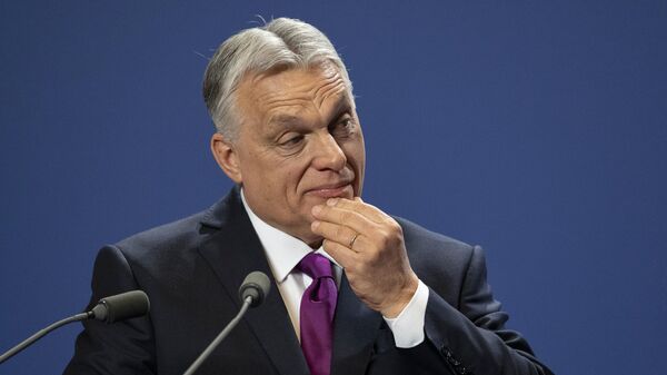 Hungarian Prime Minister Viktor Orban reacts during a press statement at the Carmelite Monastery in the Buda Castle in Budapest, Hungary, Thursday, April 3, 2025.  - Sputnik Монгол Улс