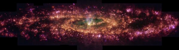 Энэ зураг нь Уран барималч галактикийг шинэ гэрэлд харуулж байна. Энэхүү хуурамч өнгөний найрлага нь устөрөгч, азот, хүхэр, хүчилтөрөгчөөс ялгардаг гэрлийн тодорхой долгионы уртыг харуулж байна. Эдгээр элементүүд нь галактик даяар хийн хэлбэрээр оршдог боловч энэ хийг гэрэлтүүлэх механизм нь галактик даяар харилцан адилгүй байж болно. - Sputnik Монгол Улс