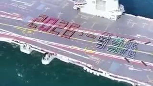 🇨🇳⭐️ Хятадын цэргийн албан хаагчид Фужиан нисэх онгоц тээгч хөлөг онгоцноос Шинэ жилийн мэндчилгээ дэвшүүлжээ - Sputnik Монгол Улс